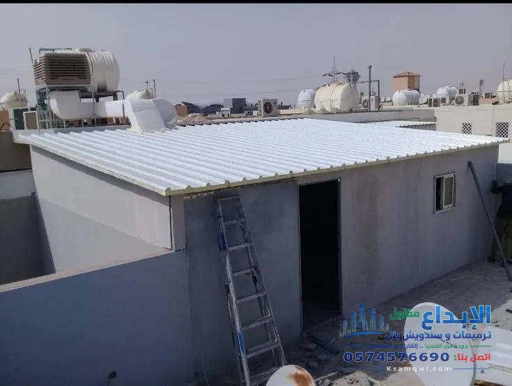 عزل أسطح مكة بمادة ساندوتش بنل